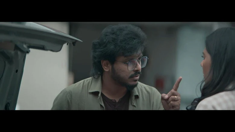 Poovellaam Kettuppaar - Malaysian Shadows and Tamil Ambiguities